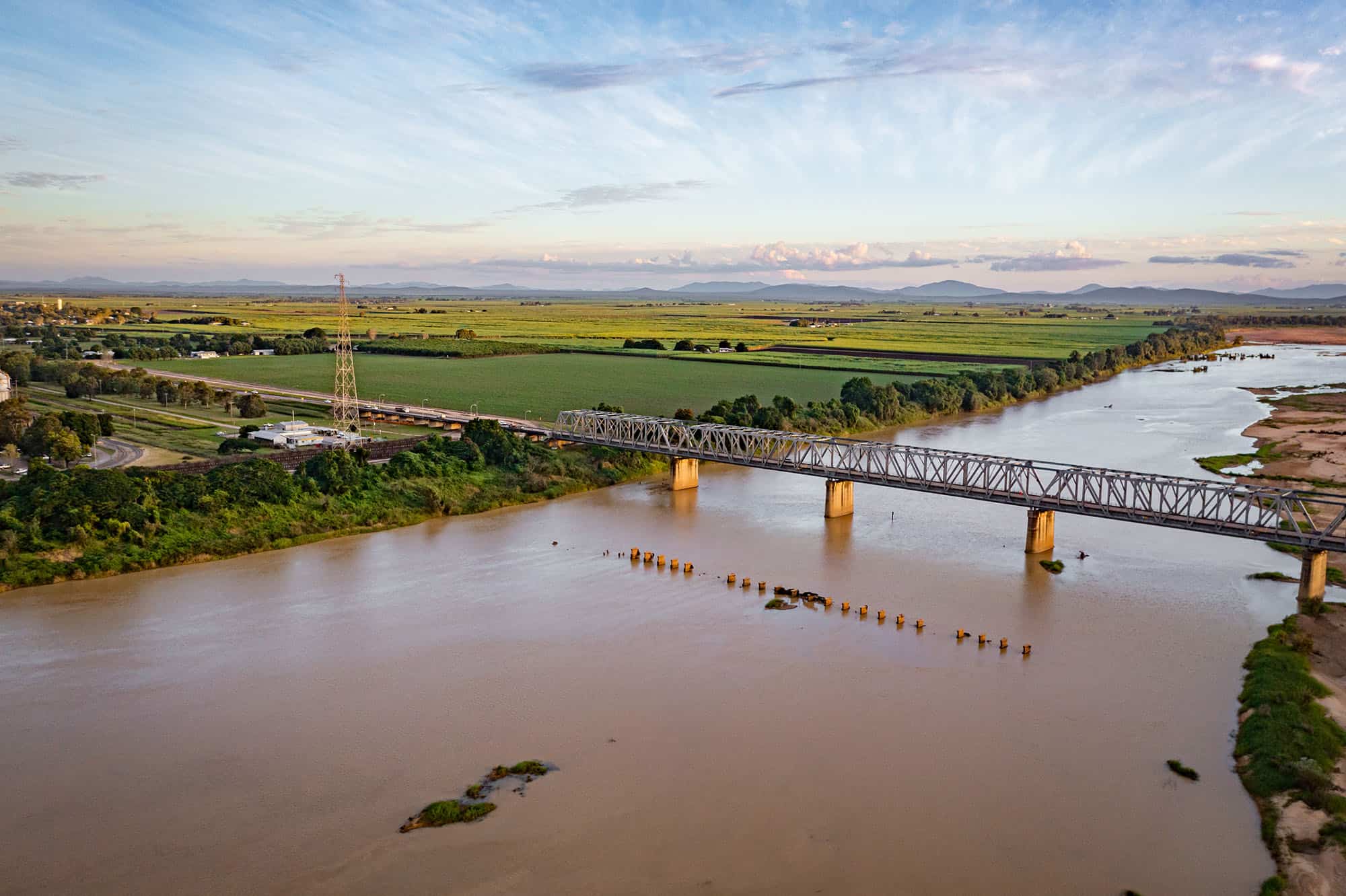 Bridge crossing the Burdekin River overlooking rehabilitation works and surrounding floodplain.
