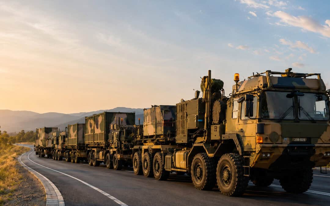 HX81 Defence vehicles travelling in convoy.